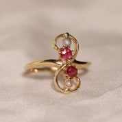 Bague vintage infini pierres rouges et perles