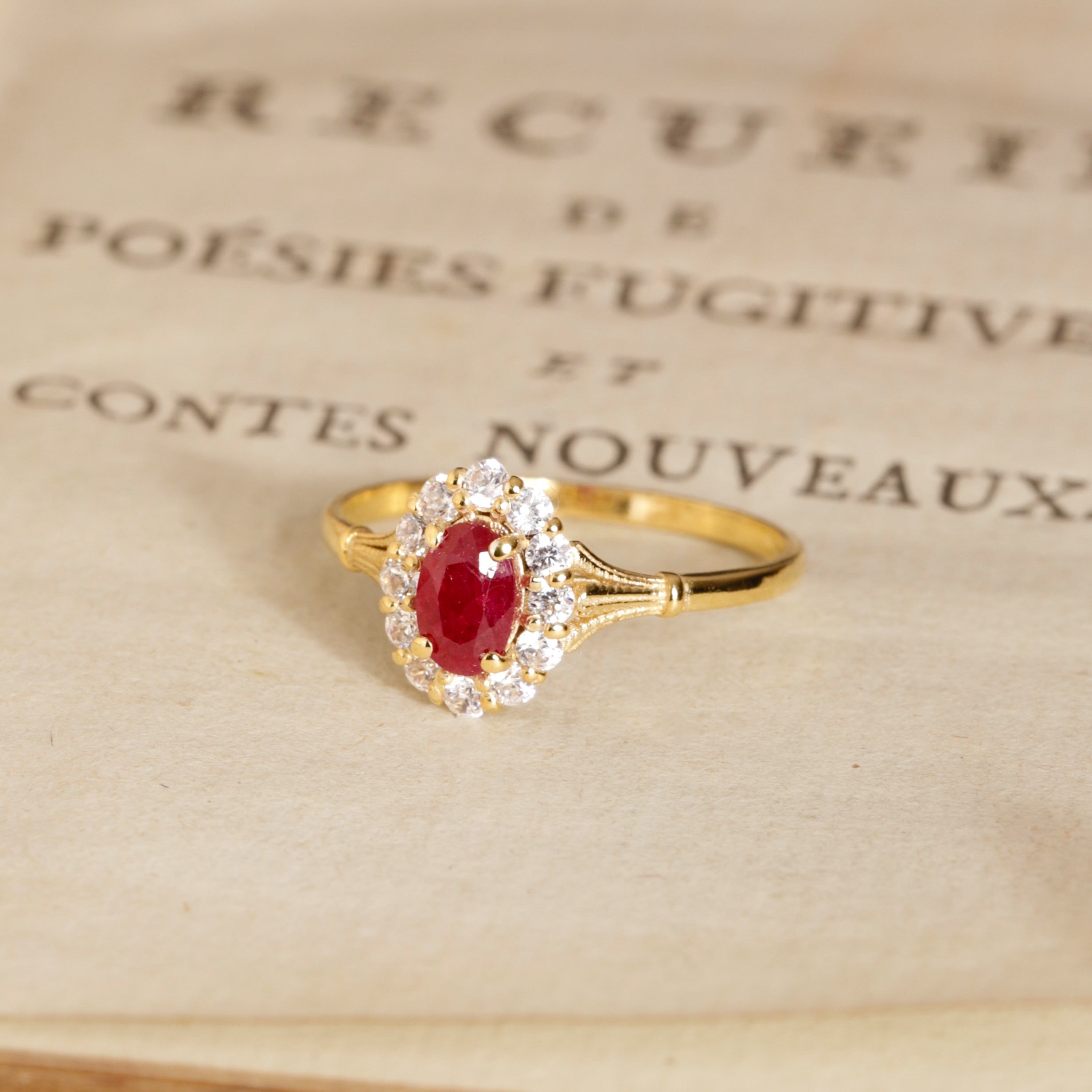 Bague marguerite 18 carats rubis diamants