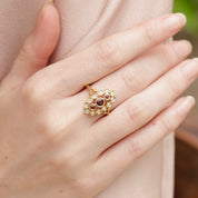 Bague marquise ovale grenats et diamants