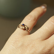 Bague vintage or rose pierre bleue et perles