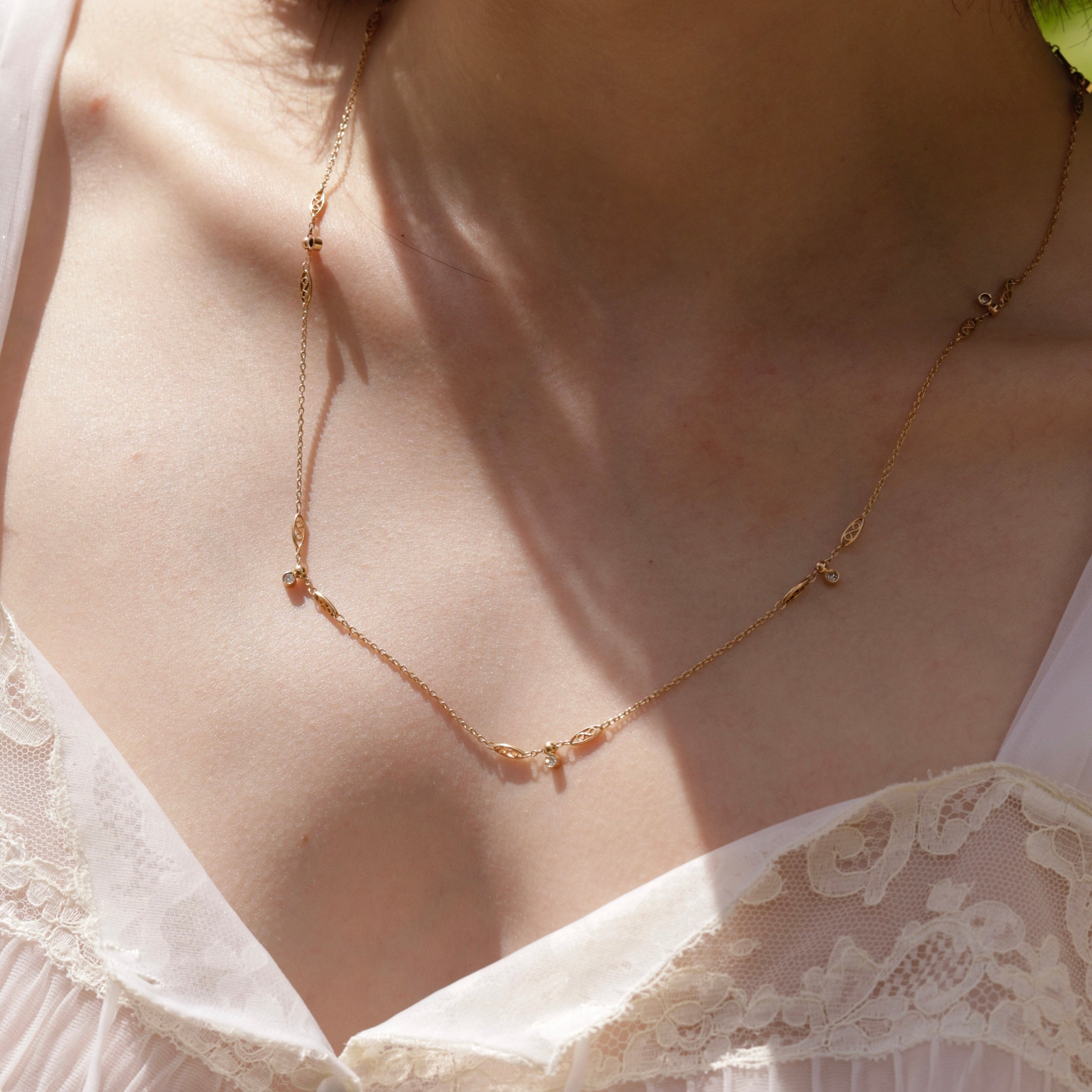 Collier filigrane diamants