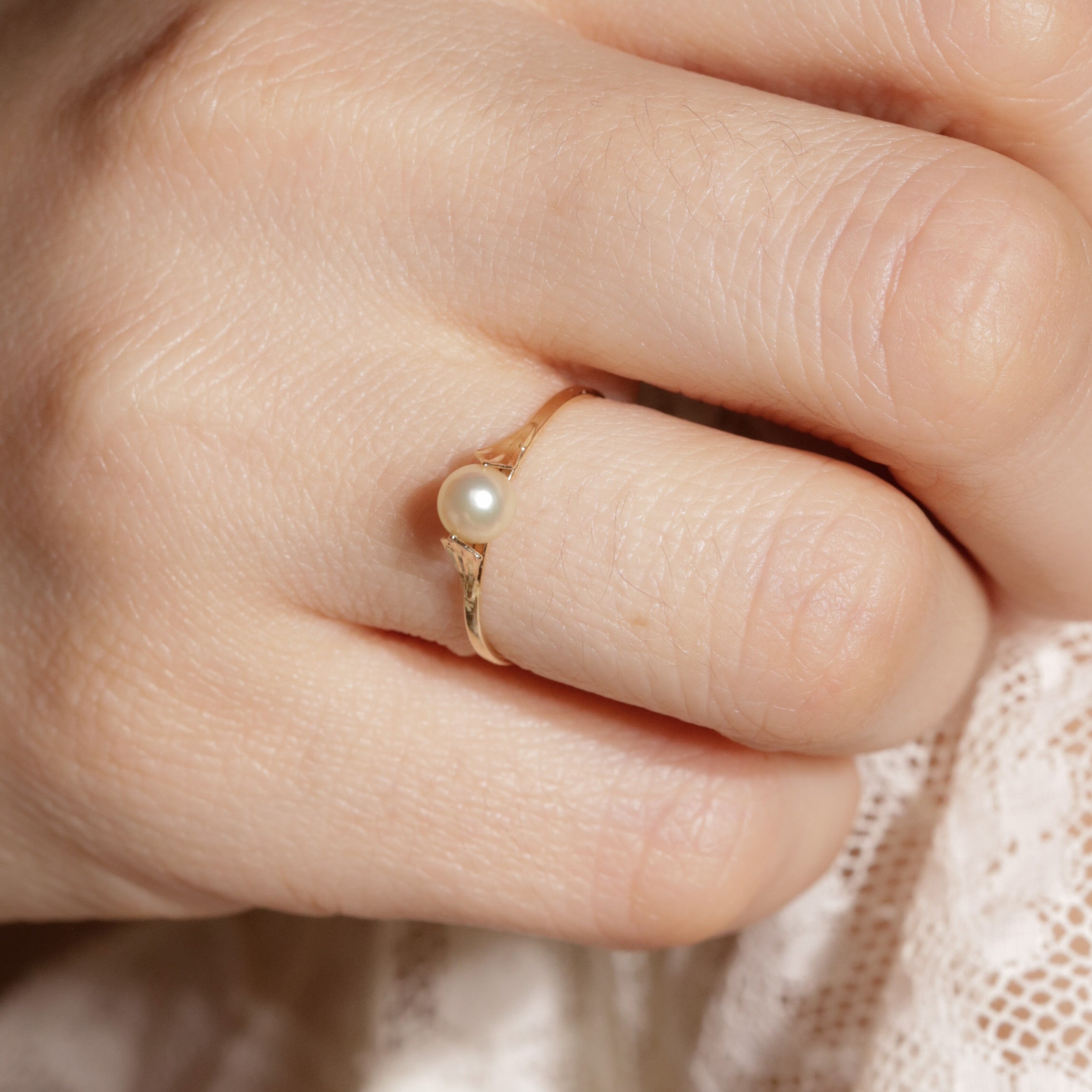 Bague solitaire perle de culture palmette