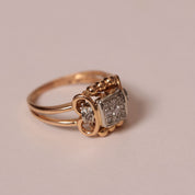 Bague ancienne volutes or rose diamant