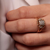 Bague ancienne volutes or rose diamant