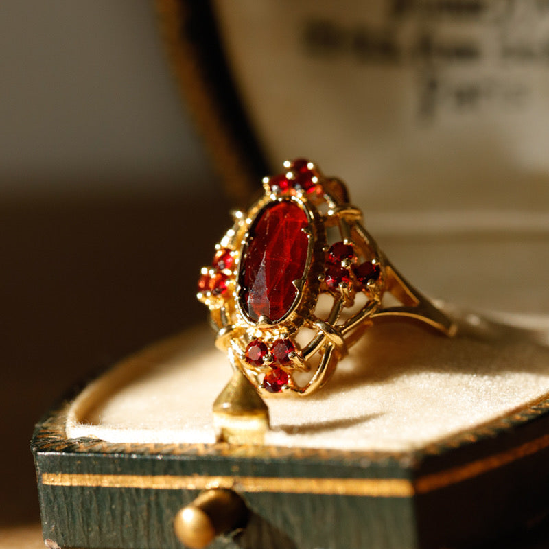 Bague marquise ajourée grenats