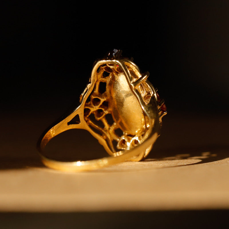 Bague marquise ajourée grenats